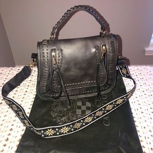 Vince Camuto handbag with “guitar strap” shoulder tote.  Mint condition!